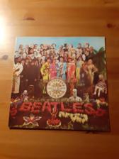 Tumnagel för auktion "THE BEATLES - SGT. PEPPER'S LONELY HEARTS CLUB BAND. (LP)"