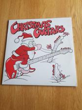 Tumnagel för auktion "V/A - Christmas guitars - LP 1987 - Moonriders, 1961, The Spinners m fl"