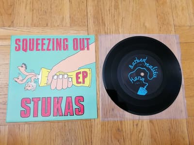 Tumnagel för auktion "Stukas – Squeezing Out, 7" (Really Fast Records, 1991)"
