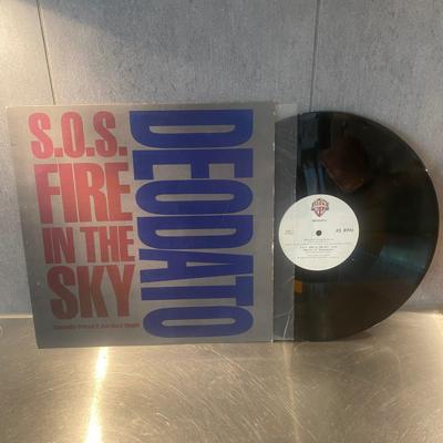 Tumnagel för auktion "Deodato - SOS fire in the sky / 12 - MAXI / 1984"