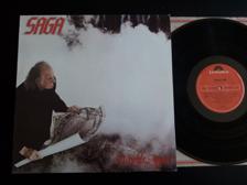 Tumnagel för auktion "SAGA - Worlds Apart LP Scandinavia -1982 Org-Inner Prog-Rock"