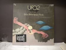 Tumnagel för auktion "UFO - 2 - FLYING - ONE HOUR SPACE ROCK - INPLASTAD - 180 G"