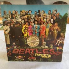 Tumnagel för auktion "Beatles LP,Sgt Peppers Lonely Hearts Club Band,Parloph. Stereo,FOC,Insert, NL,Re"