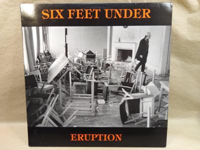 Tumnagel för auktion "Six Feet Under - Eruption Vinyl Lp HAWKLP 2103 se bild + text"