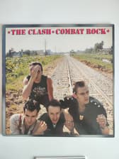 Tumnagel för auktion "The Clash - Combat Rock med stor poster"