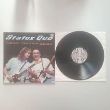 Tumnagel för auktion "LP. STATUS QUO-ROCK 'TIL YOU DROP HOLL PRESS"