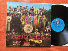 Tumnagel för auktion "THE BEATLES Sgt Pepper's lonely hearts club band LP Ger/UK EMI/ODEON HÖRZU "