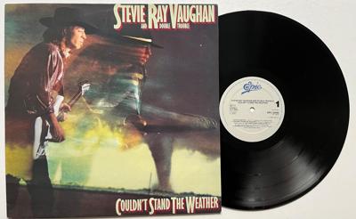 Tumnagel för auktion "** Steve Ray Vaughan and Double Trouble - Couldn't Stand The Weather **"