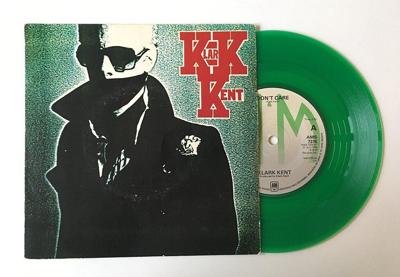 Tumnagel för auktion "Klark Kent ”Don't Care” 1978 DIY The Police Copland Grön Marble vinyl Mispress"