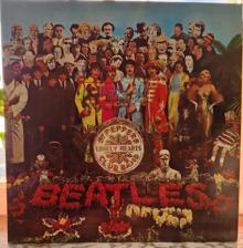 Tumnagel för auktion "The Beatles-Sgt Pepper's Lonely Hearts Club band. LP"