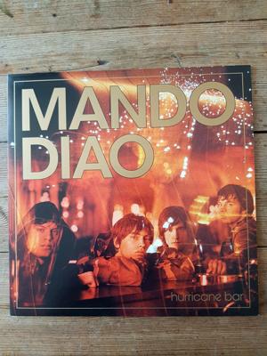 Tumnagel för auktion "MANDO DIAO  - HURRICANE BAR  - BLACK VINYL  - LP"