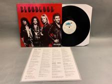 Tumnagel för auktion "Bloodgood - Rock In A Hard Place UK Orig-88 FINT EX RARE !!!!!"