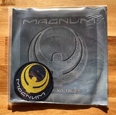 Tumnagel för auktion "Magnum Days Of No Trust Vinyl 7 singel Limited Edition"