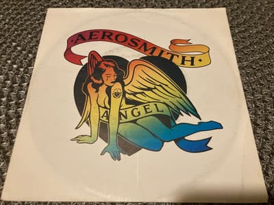 Tumnagel för auktion "Aerosmith - Angel, 7” Vinylsingel"