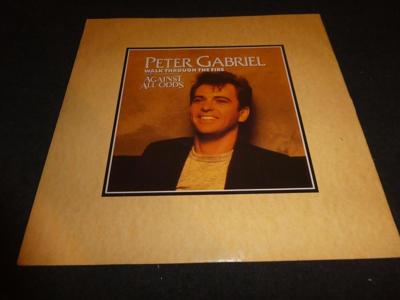 Tumnagel för auktion "Peter Gabriel - Walk through the fire/I have the touch - UK 12" - 1984"