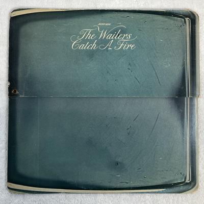 Tumnagel för auktion "THE WAILERS catch a fire LP -73 UK ISLAND ILPS 9241 *** Rare ZIPPO cover ***"