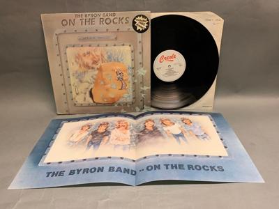 Tumnagel för auktion "The Byron Band - On The Rocks UK Orig-81 HYPE STICKER POSTER RARE !!!!!"