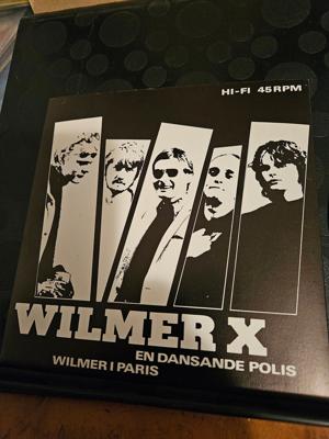 Tumnagel för auktion "Wilmer x si 1981 en dansande polis"