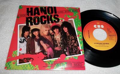 Tumnagel för auktion "Hanoi Rocks / Up around the bend / A4513"