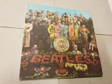 Tumnagel för auktion "The Beatles - Sgt. Pepper's Lonely Hearts Club Band LP UK-67"