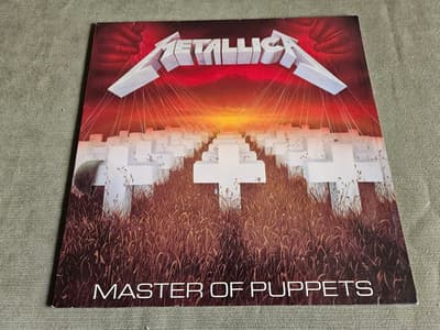 Tumnagel för auktion "Metallica-Master Of Puppets / Vertigo 838 141-1 fodral i fint skick"