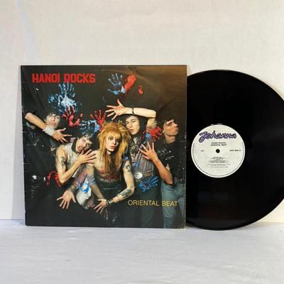 Tumnagel för auktion "Hanoi Rocks. Oriental Beat. NCB JHN 2063 Finland Purple Label."