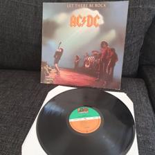 Tumnagel för auktion "AC/DC Let there be rock vinyl"