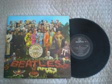 Tumnagel för auktion "LP Beatles Sgt Pepper's Lonely Hearts Club Band, holländsk nyare pressning"