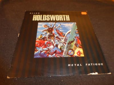 Tumnagel för auktion "Allan Holdsworth - Metal fatigue - NED LP - 1985 - Jazz-Rock"