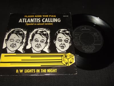 Tumnagel för auktion "45 - FLASH AND THE PAN. Atlantis Calling/Lights in the night. 1980"