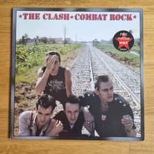 Tumnagel för auktion "The Clash - Combat Rock (w poster) LP NL 1982"