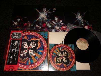 Tumnagel för auktion "KISS ROCK AND ROLL OVER JAPAN LP OBI POSTER KLISTERMÄRKET VERY RARE "