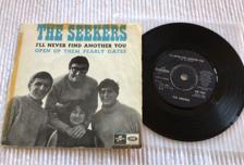 Tumnagel för auktion "The Seekers - I’ll Never find another You , 7” Vinyl, -64 , Svensk Press"