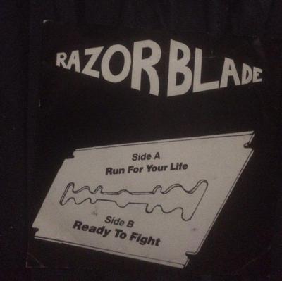 Tumnagel för auktion "RAZORBLADE RUN FOR YOUR LIFE/READY TO FIGHT"
