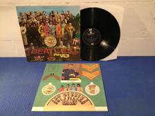 Tumnagel för auktion "The Beatles - Sgt Peppers Lonely Hearts Club Band UK Press-70’s !!!!!"