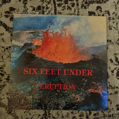 Tumnagel för auktion "Six Feet Under - Eruption LP"