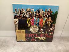 Tumnagel för auktion "Beatles: SGT pepper lonely hearts, Anniversary adition, inplastad , sealed,180gr"