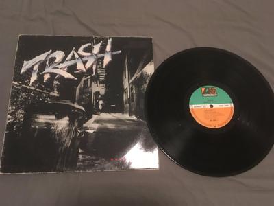 Tumnagel för auktion "Trash - Burnin` Rock vinyl LP "