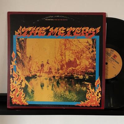 Tumnagel för auktion "The Meters Fire on the Bayou 1975"