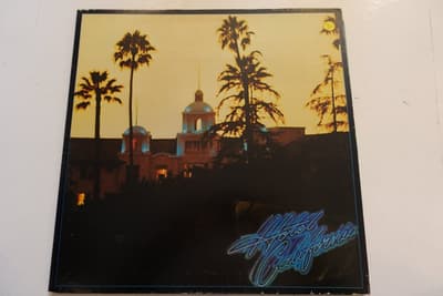 Tumnagel för auktion "Eagles – Hotel California. Asylum Records – 7E-1084 US 1976. Very nice copy!"