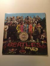 Tumnagel för auktion "THE BEATLES- SGT PEPPER'S LONELY HEARTS CLUB BAND. (LP)"