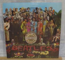 Tumnagel för auktion "BEATLES :: SGT.PEPPER`S LONELY HEARTS CLUB BAND  (LP) GER Press  PIC. Disc"