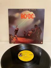 Tumnagel för auktion "AC/DC - Let There be Rock USA press på Atco"