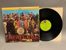 Tumnagel för auktion "The Beatles - Sgt. Peppers Lonely Hearts Club Band US Press-69 !!!!!"