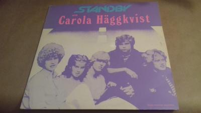 Tumnagel för auktion "STANDBY with CAROLA HÄGGKVIST - LP - ROSA HONUNG RECORDS 1983"