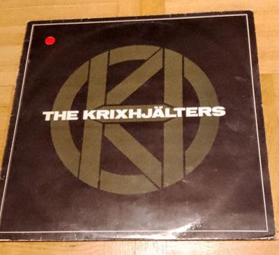 Tumnagel för auktion "The Krixhjälters / Vinyl!!/ Punk/ Asta Kask"