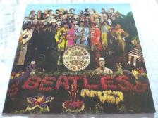 Tumnagel för auktion "The Beatles - Sgt peppers lonely hearts club band  - LP - Röd vinyl"