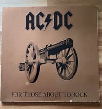 Tumnagel för auktion "AC/DC - For Those About To Rock (We Salute You) Vinyl."