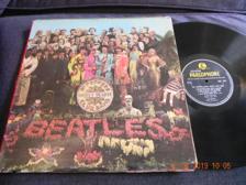 Tumnagel för auktion "The Beatles Lp. SGT. Peppers Lonely Hearts Club Band.Tidig pressning !"