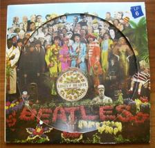 Tumnagel för auktion "BEATLES SGT:PEPPERS LONELY HEARTS CLUB BAND BILDSKIVA 1967"